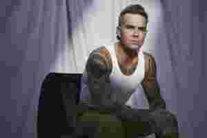Robbie Williams drops new single ‘Spies’ and unveils ‘BRITPOP’ tracklist