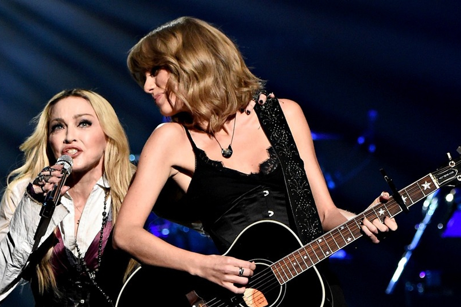 Taylor Swift plays guitar for Madonna at iHeartRadio awards