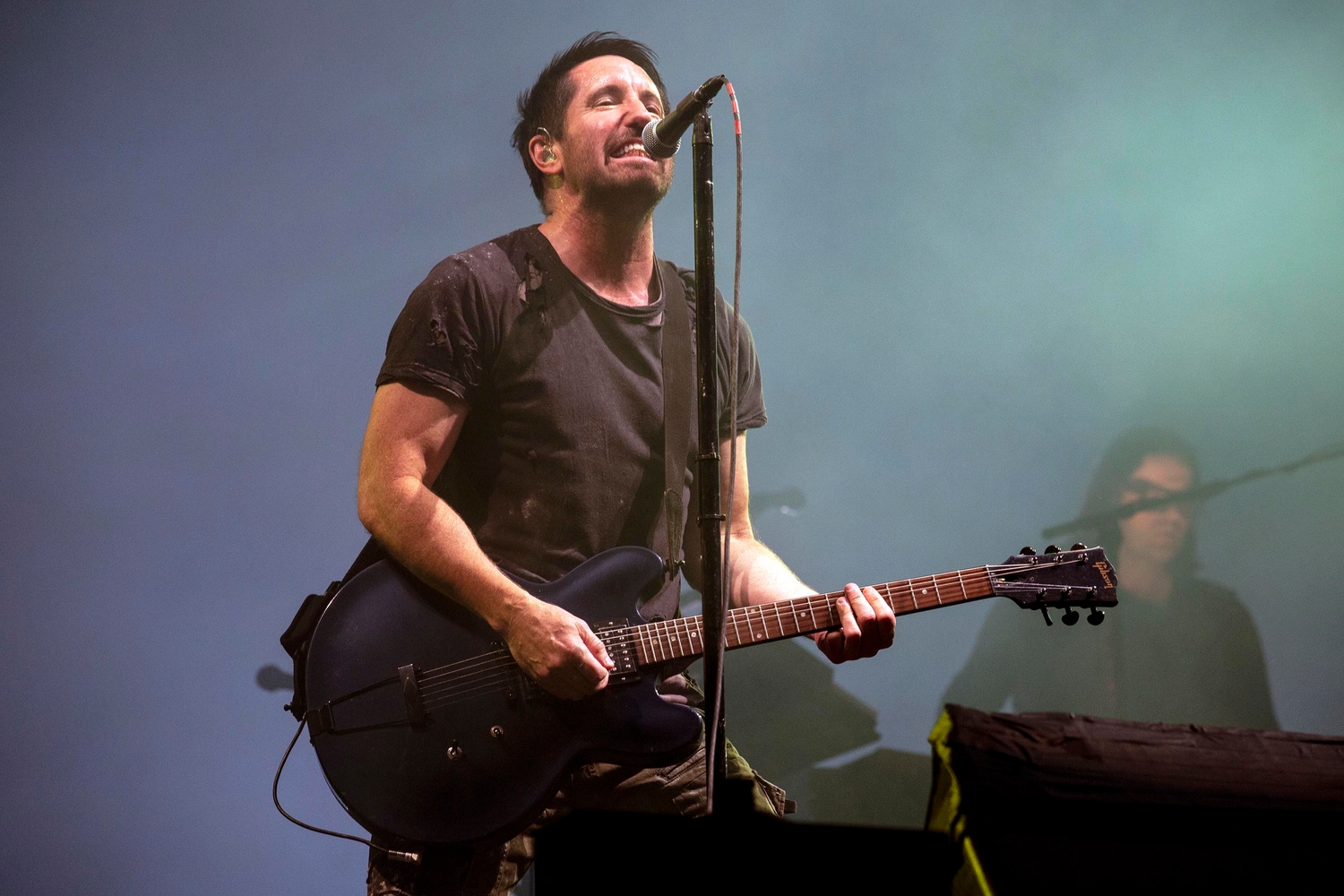 Queens of the Stone Age rally against the authorities and Nine Inch Nails get down and dirty on the final day of Mad Cool Festival