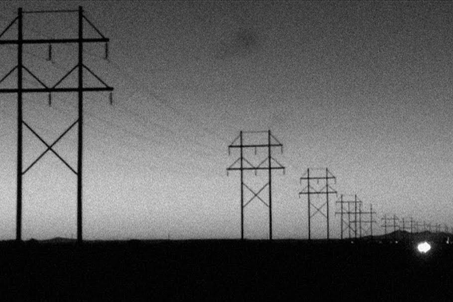 Boston trio E share black-and-white video for the creepy, brilliant 'Hole In Nature'