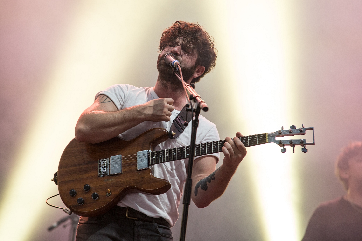 Foals frontman Yannis Philippakis talks "shady macho behaviour" at gigs