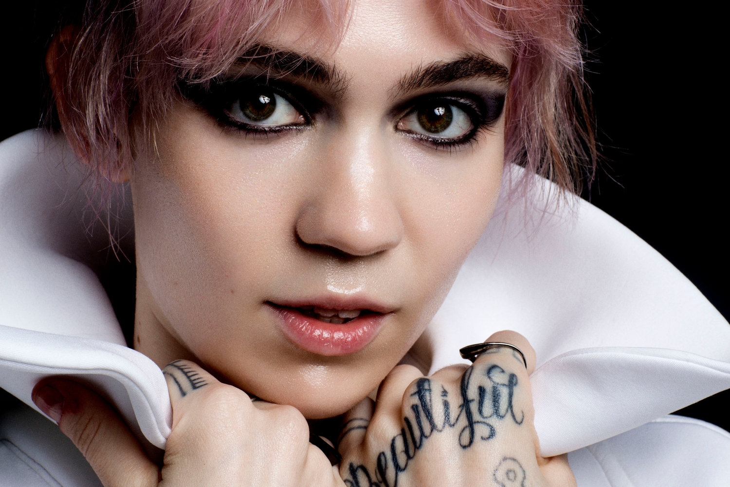 Grimes and Sia support fight-back against Donald Trump's Immigration order