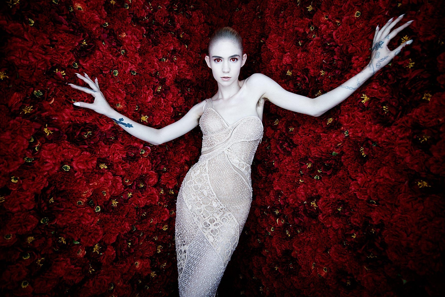Grimes debuts new songs during U.S. festival performance