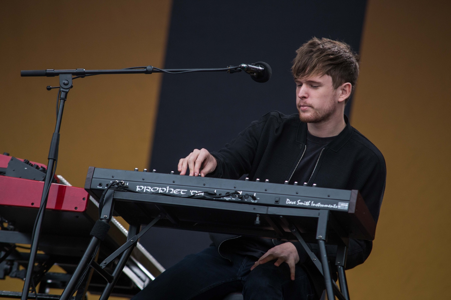 James Blake and band smile throughout their Latitude return