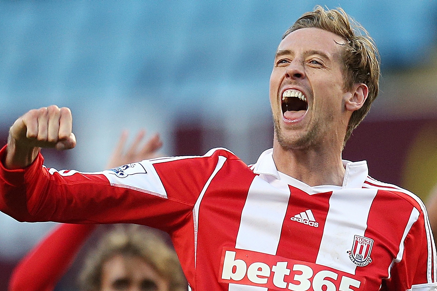 Peter Crouch tries his hand at crowdsurfing during Kasabian gig
