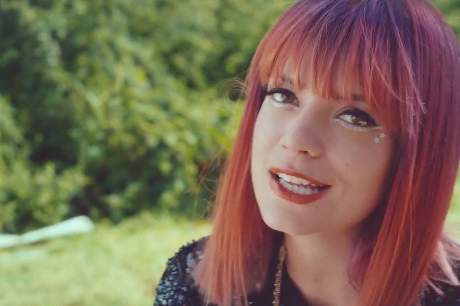 Lily Allen goes back to Glastonbury for ‘As Long As I Got You’ video
