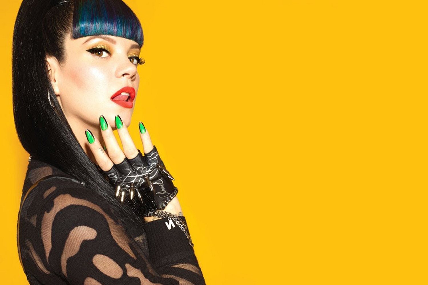 Lily Allen on Glastonbury storm: “They were shoving rain out of my dressing room with brooms”