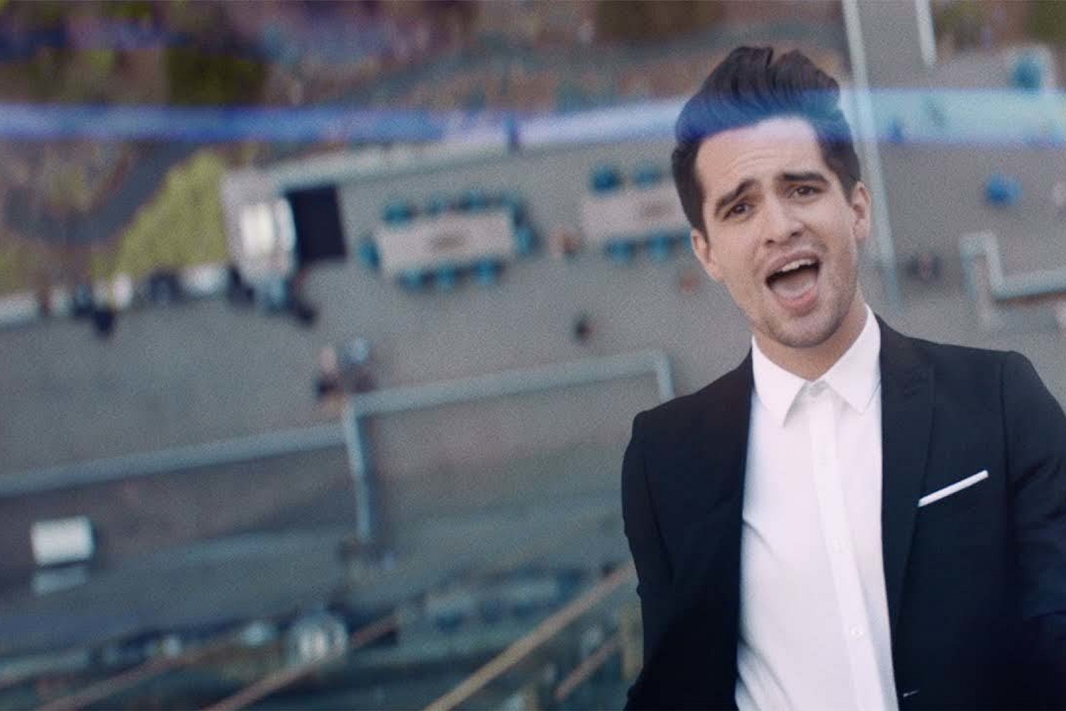 Brendon Urie scales a skyscraper in Panic! At The Disco’s new video for ‘High Hopes’