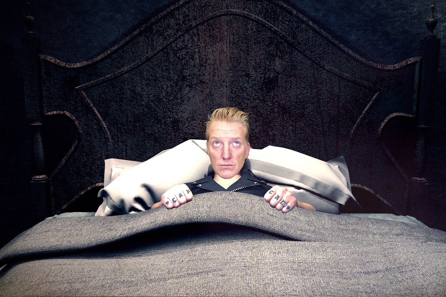 Queens Of The Stone Age share spooky video for ‘Head Like A Haunted House’