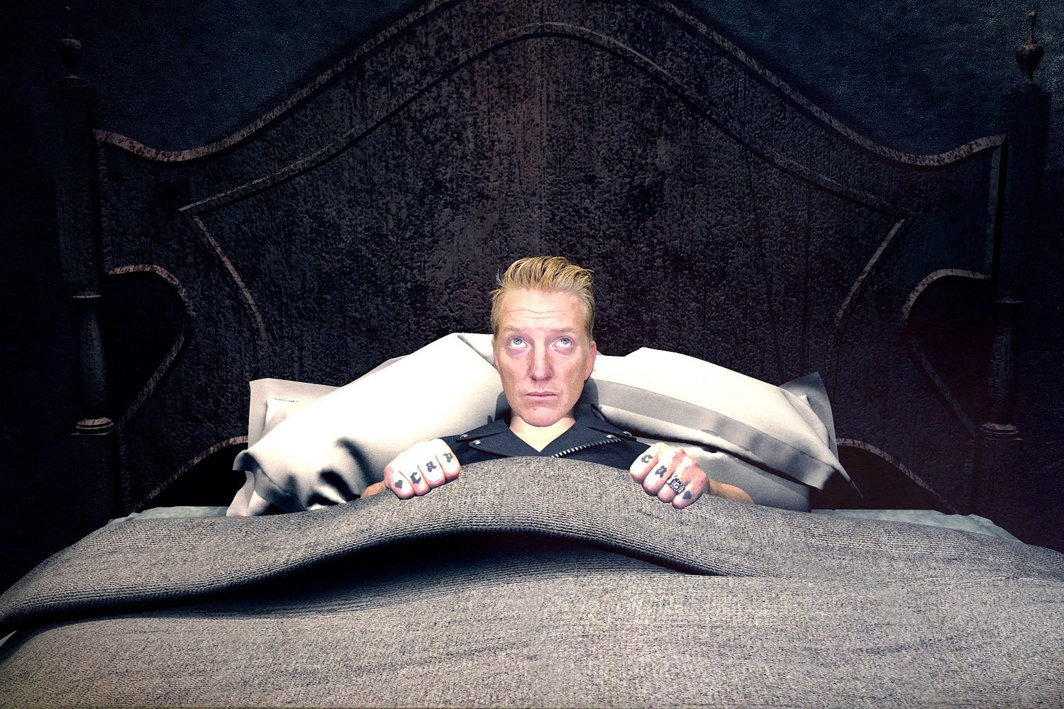 Queens Of The Stone Age share spooky video for 'Head Like A Haunted House'